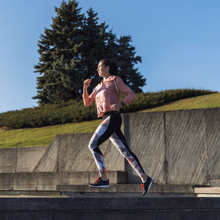 A quiet corner with a rolled up yoga mat and a plant, creating a peaceful atmosphere.